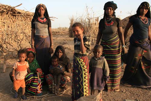 An Afar woman with children